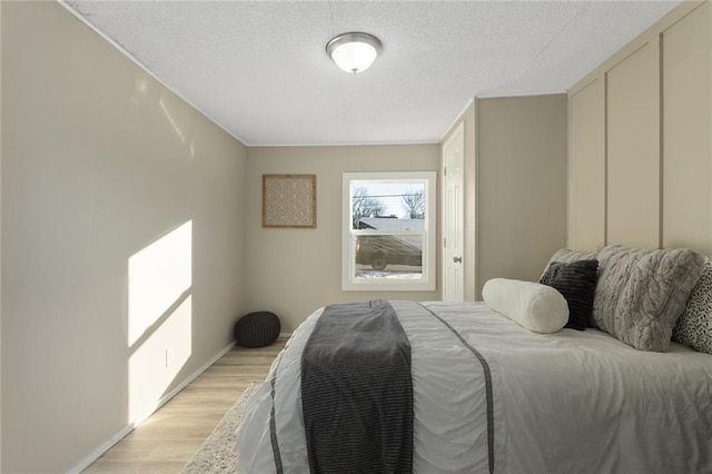 bedroom featuring light hardwood / wood-style floors