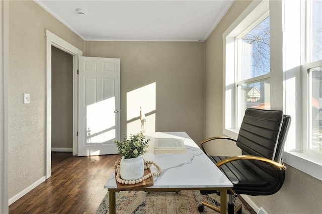 home office featuring crown molding and dark hardwood / wood-style flooring