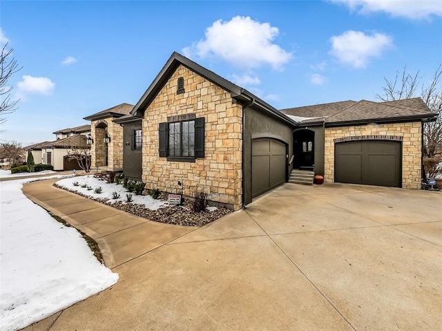 view of front of home with a garage