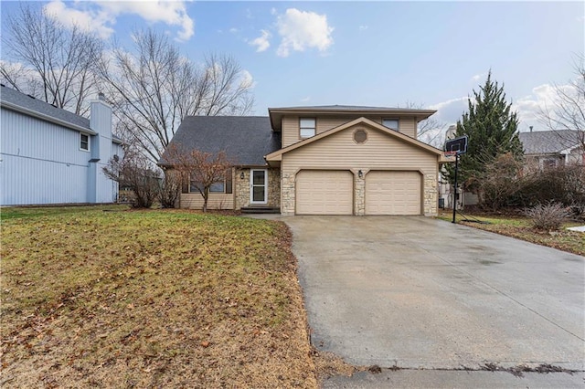 view of front property with a garage and a front yard