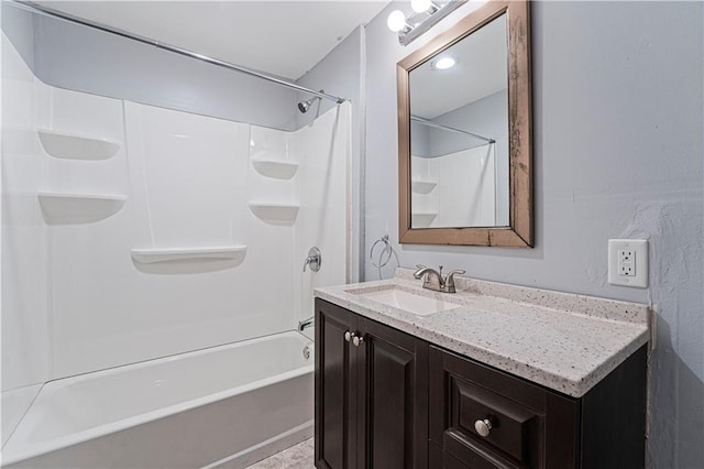 bathroom featuring vanity and bathing tub / shower combination