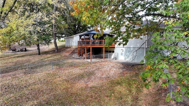 view of yard featuring a wooden deck