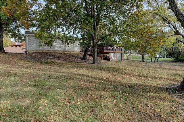 view of yard with a wooden deck