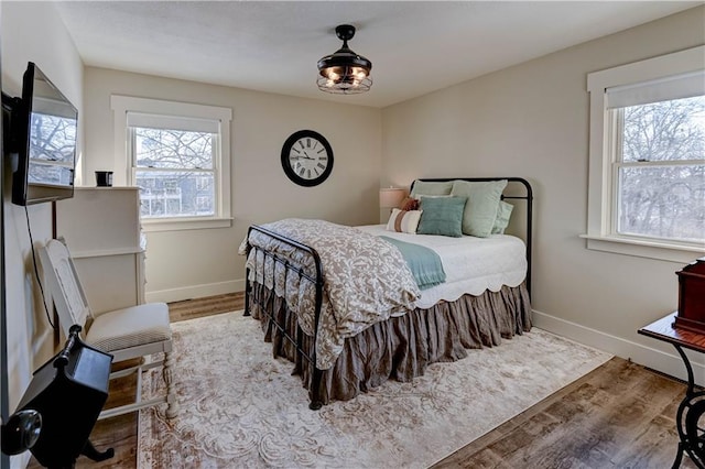 bedroom featuring hardwood / wood-style floors