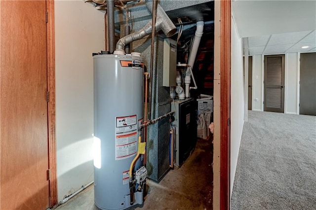 utility room with water heater