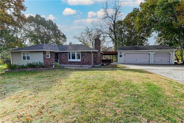 ranch-style home with a garage, a front lawn, and a carport