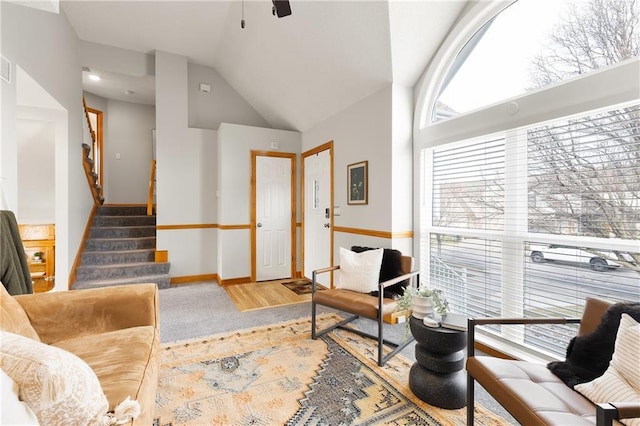 living room with lofted ceiling