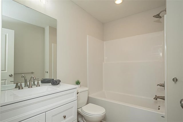 full bathroom with toilet, washtub / shower combination, and vanity