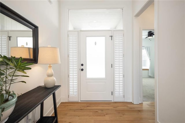 entrance foyer with light wood-type flooring