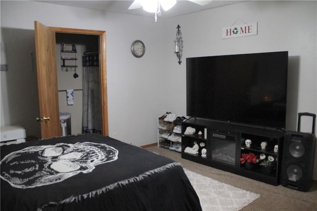 carpeted bedroom featuring a ceiling fan