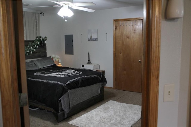 bedroom featuring carpet floors, ceiling fan, and electric panel