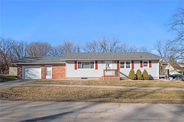 ranch-style house with an attached garage, driveway, a front lawn, and brick siding