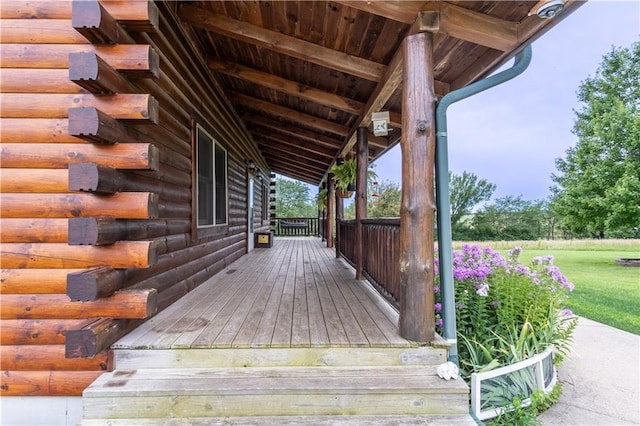 wooden deck featuring covered porch