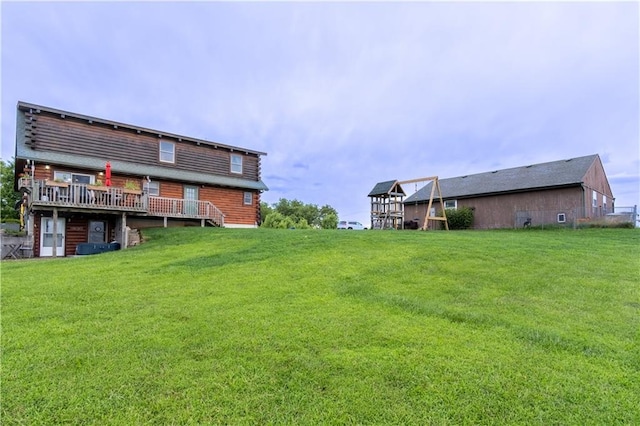 view of yard featuring a deck