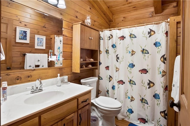 bathroom featuring vanity, wooden walls, toilet, and walk in shower