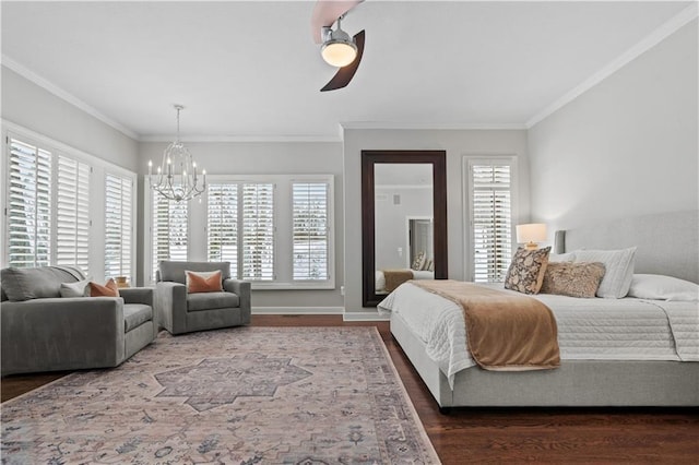 bedroom with multiple windows, ornamental molding, and dark wood finished floors