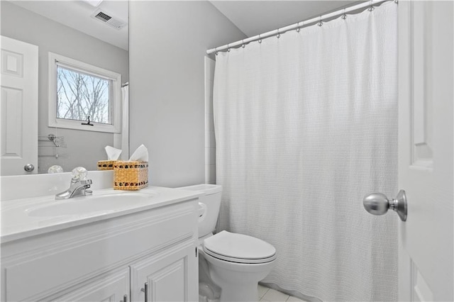 full bath with visible vents, toilet, vanity, a shower with curtain, and tile patterned floors