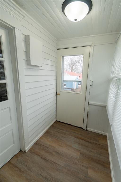 doorway to outside with hardwood / wood-style floors