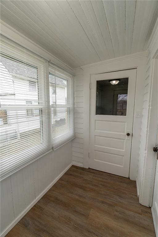 unfurnished sunroom with wooden ceiling