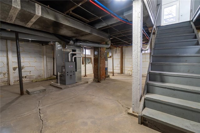 basement featuring heating unit