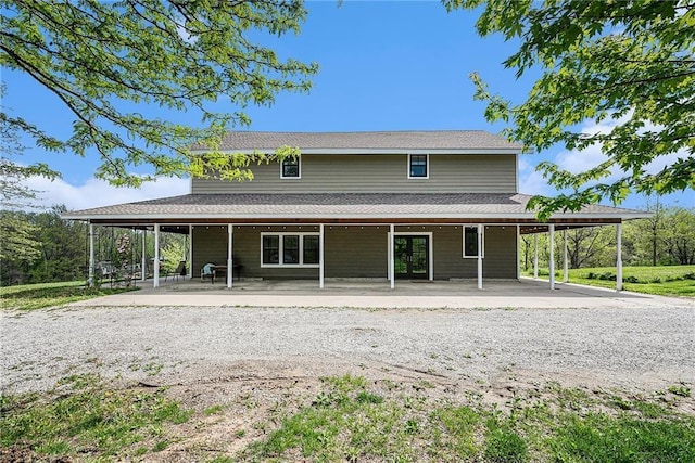 back of property with a patio area