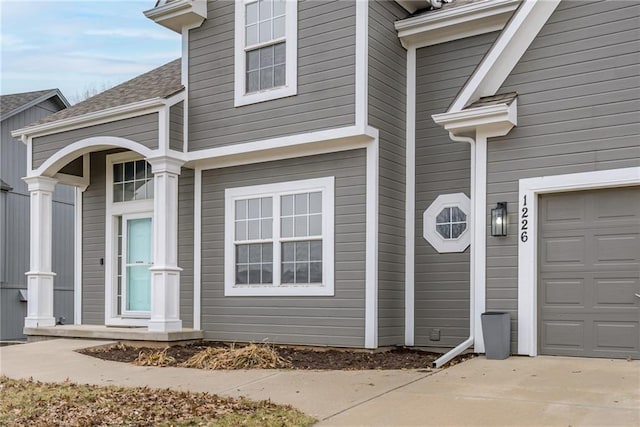 property entrance featuring a garage