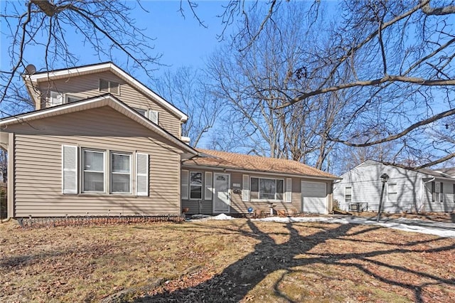 view of front of property featuring a garage