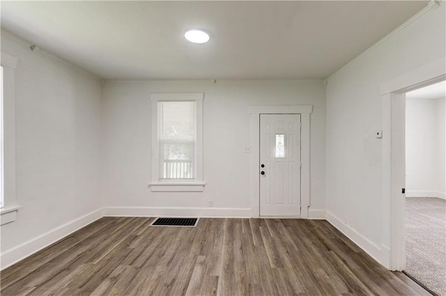 foyer with dark hardwood / wood-style flooring