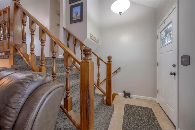 foyer with light tile patterned flooring