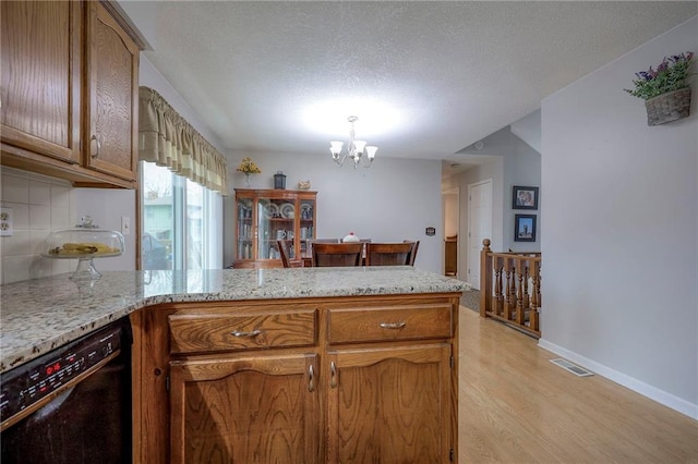 kitchen with dishwasher, an inviting chandelier, tasteful backsplash, light hardwood / wood-style floors, and kitchen peninsula