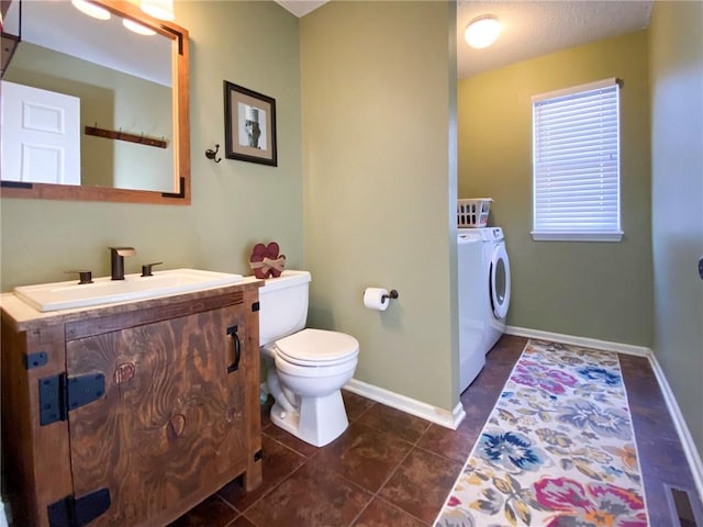 bathroom featuring vanity, tile patterned floors, and toilet