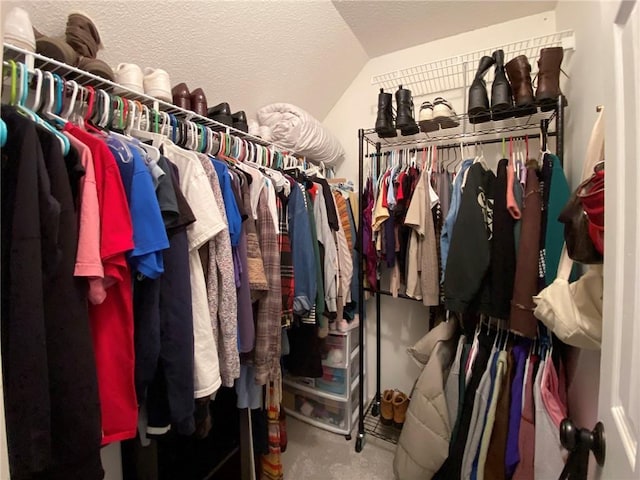 spacious closet featuring vaulted ceiling