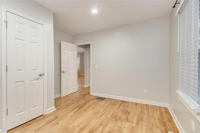 unfurnished bedroom featuring light hardwood / wood-style flooring