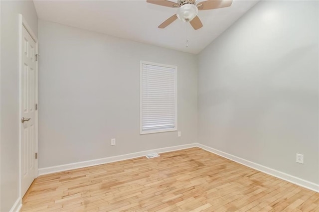 spare room with ceiling fan and light hardwood / wood-style flooring