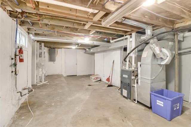 basement featuring electric panel