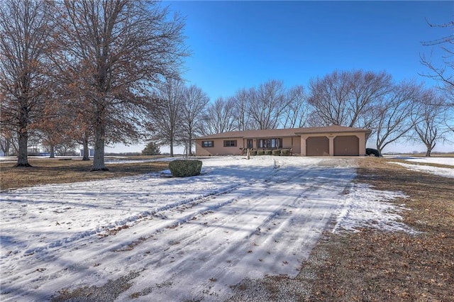 ranch-style house with a garage