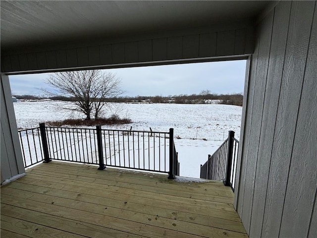 view of snow covered deck