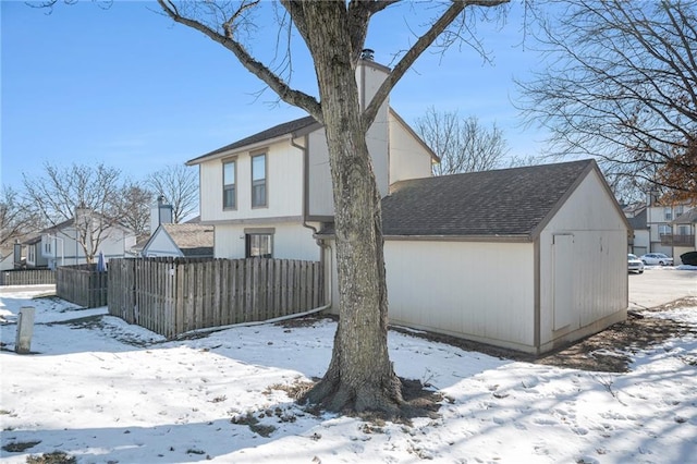 view of snow covered property