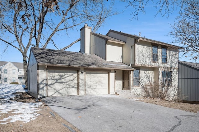 view of front of home with a garage