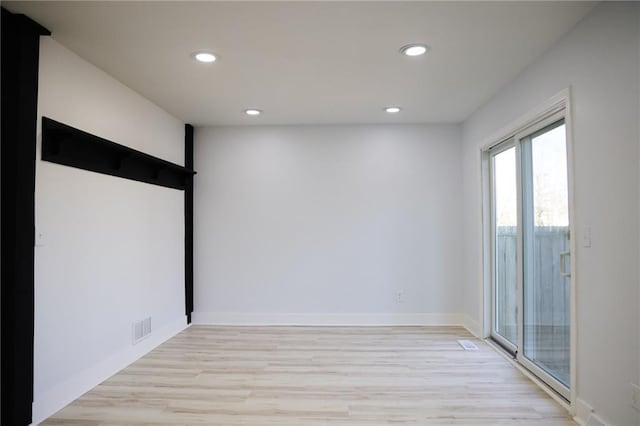 empty room featuring light hardwood / wood-style floors