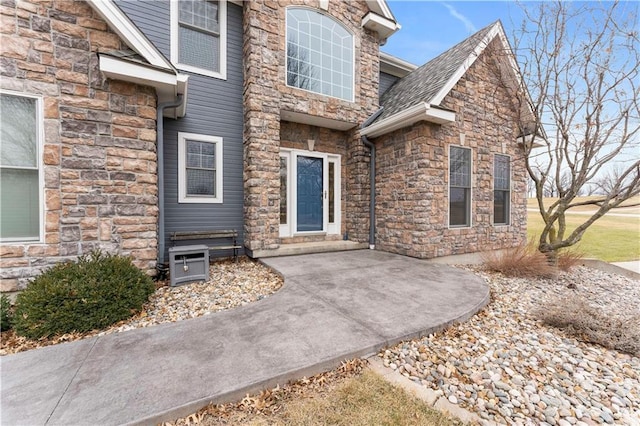 doorway to property featuring a patio