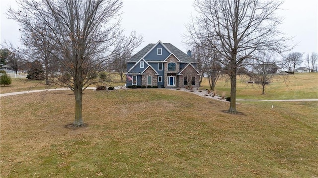 view of front of house with a front lawn