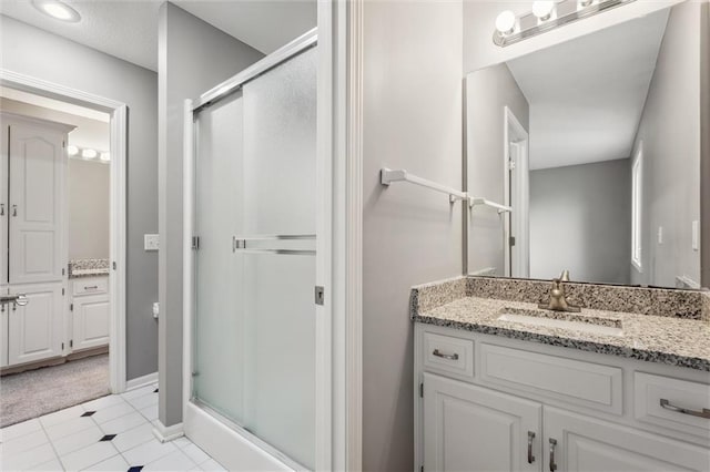 4749 SW Gull Point Dr, Lees Summit, MO 64082 - full bath with a stall shower, vanity, and tile patterned flooring