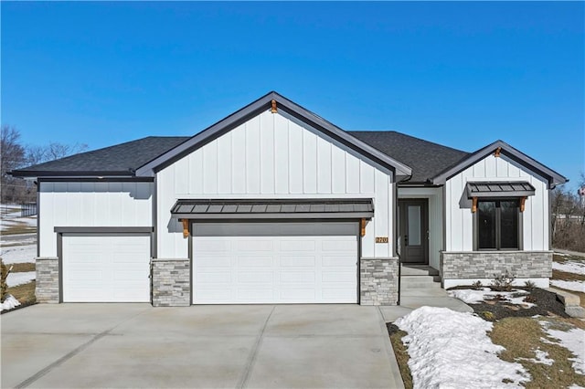 modern farmhouse featuring a garage