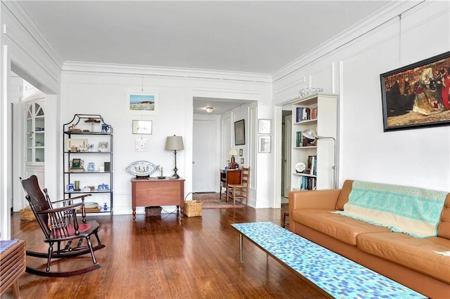 living room with ornamental molding and dark hardwood / wood-style floors