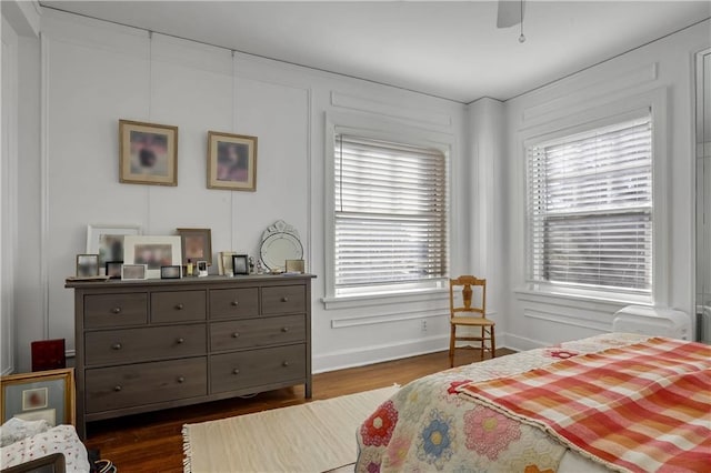 bedroom featuring dark hardwood / wood-style floors and ceiling fan