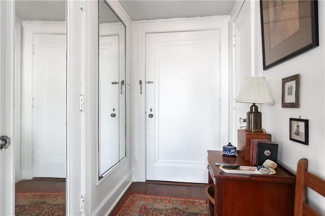 doorway to outside with dark hardwood / wood-style flooring