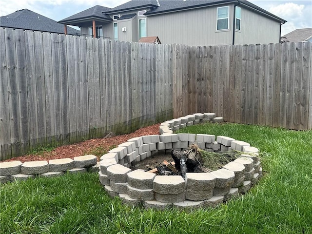 304 S Jackson St, Archie, MO 64725 - view of yard featuring a fire pit
