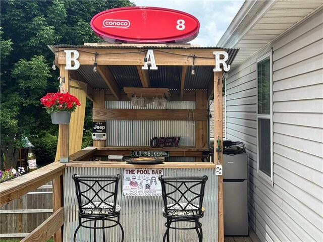 304 S Jackson St, Archie, MO 64725 - view of wooden deck