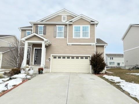 view of front of home with a garage